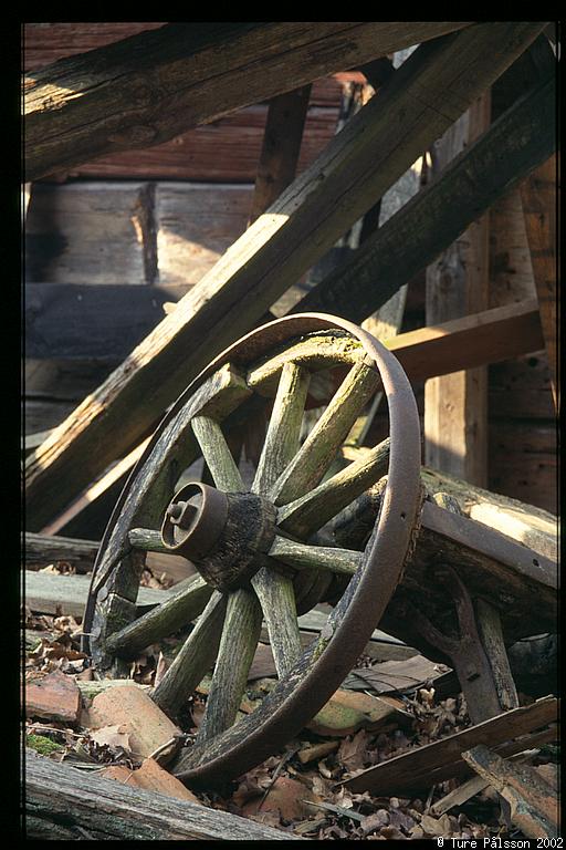 Old wheel in ruin